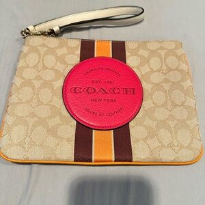 BRAND NEW coach bag with wrist strap